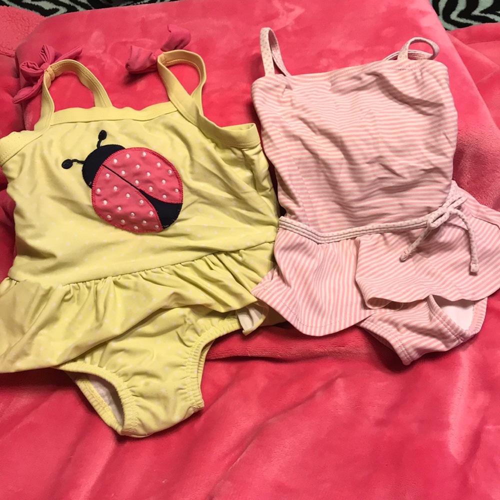 Two 2T girls swimsuits. Both in great condition!